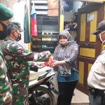 TNI-Polri Distribusikan Makanan 1